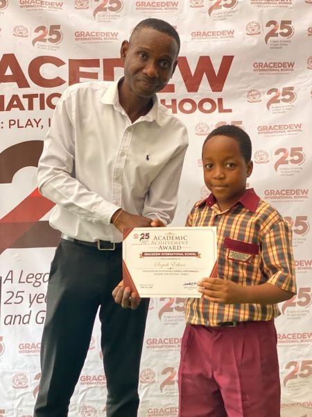 A Gracedew pupil receiving an award at the 25th anniversary prize-giving