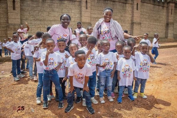 Gracedew pupils in 25th anniversary t-shirts on an excursion at Aburi