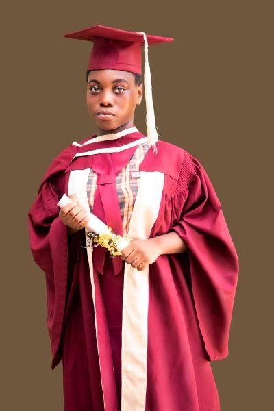 A Gracedew graduate in cap and gown
