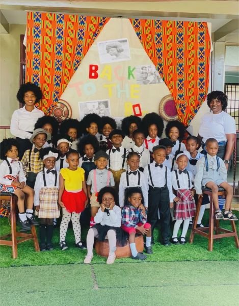 Gracedew pupils and staff grouped for a heritage day photo